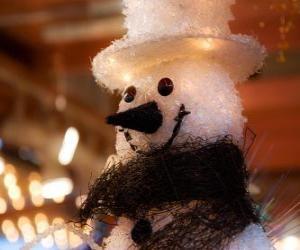 Puzzle Χιονάνθρωπος με πρόσωπο με καπέλο και φουλάρι